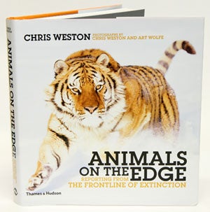 Stock ID 30687 Animals on the edge: reporting from the frontline of extinction. Chris Weston, Art Wolfe.